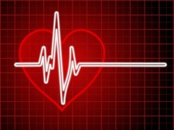 sfondo rosso con quadretti con elettrocardiogramma in bianco e cuore delineato sullo sfondo